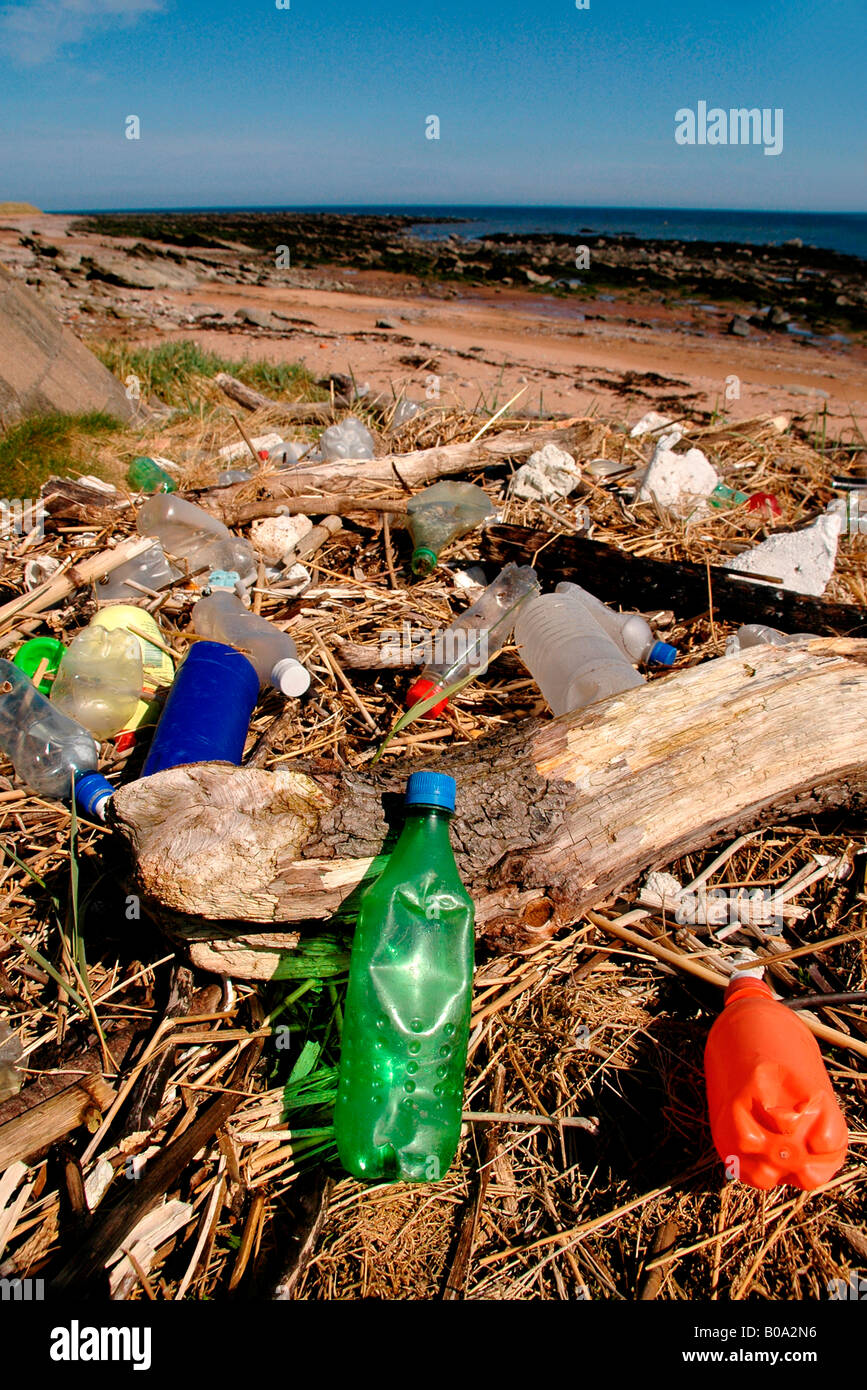 Rubbish / litter strewn on a beach. Stock Photo