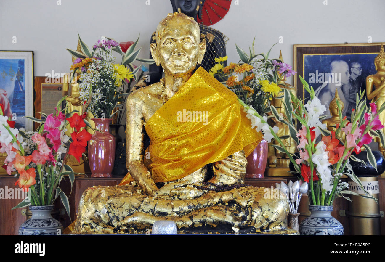 golden statue of an adored monk at Wat Phan On Temple, Thailand, Chiang Mai Stock Photo