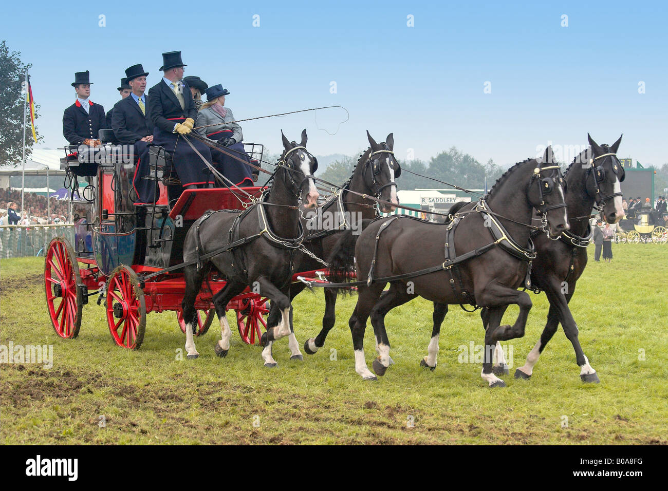 Stagecoach and Passengers At The Newbury Show Stock Photo