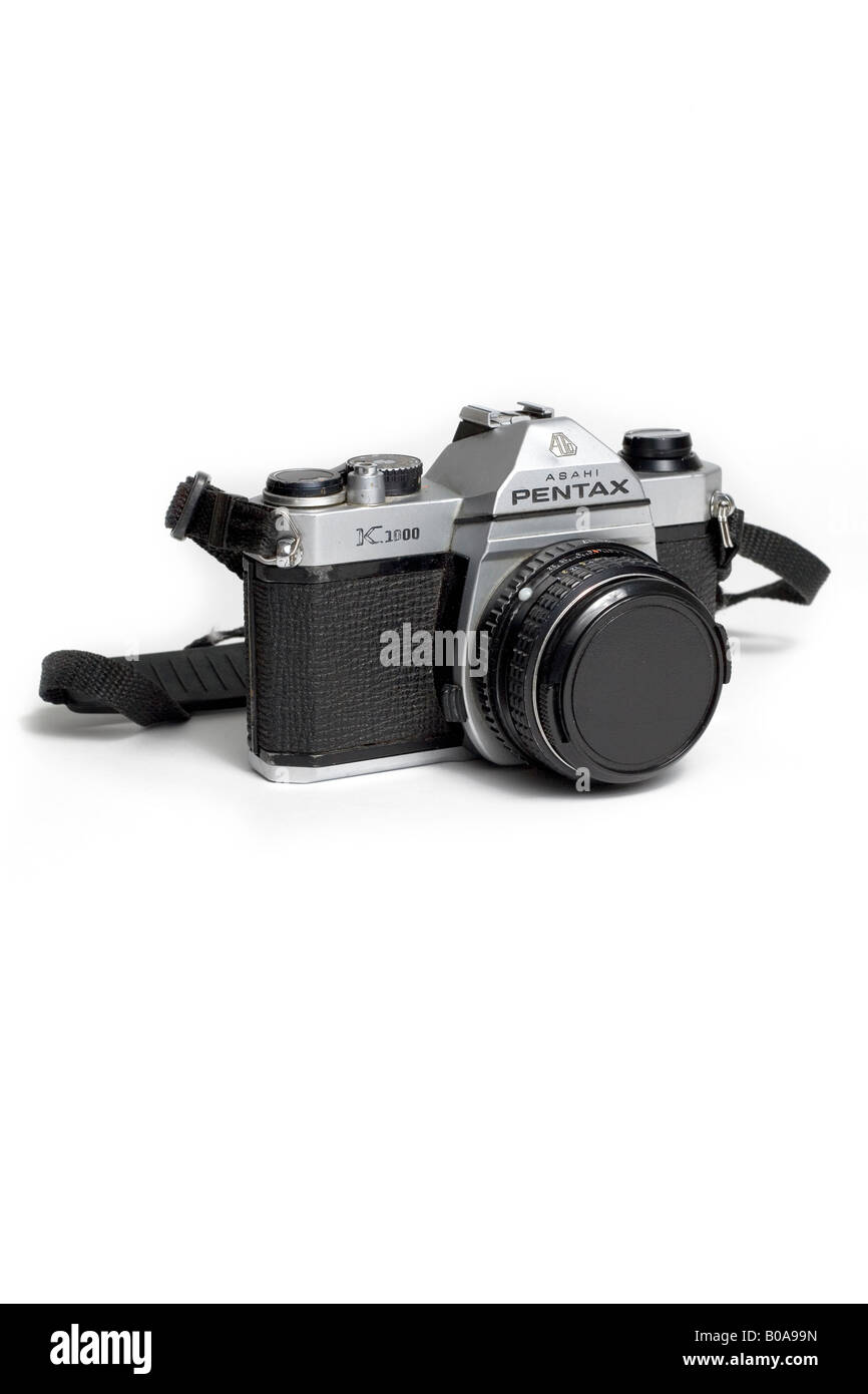 pentax k1000 35mm camera with strap against a white background Stock