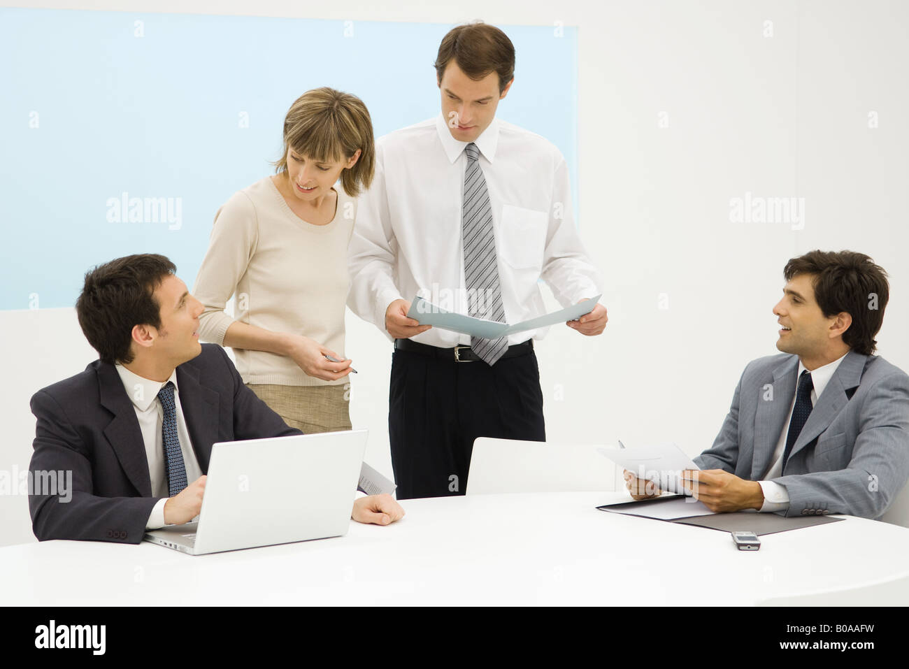 Business executives working together in office Stock Photo