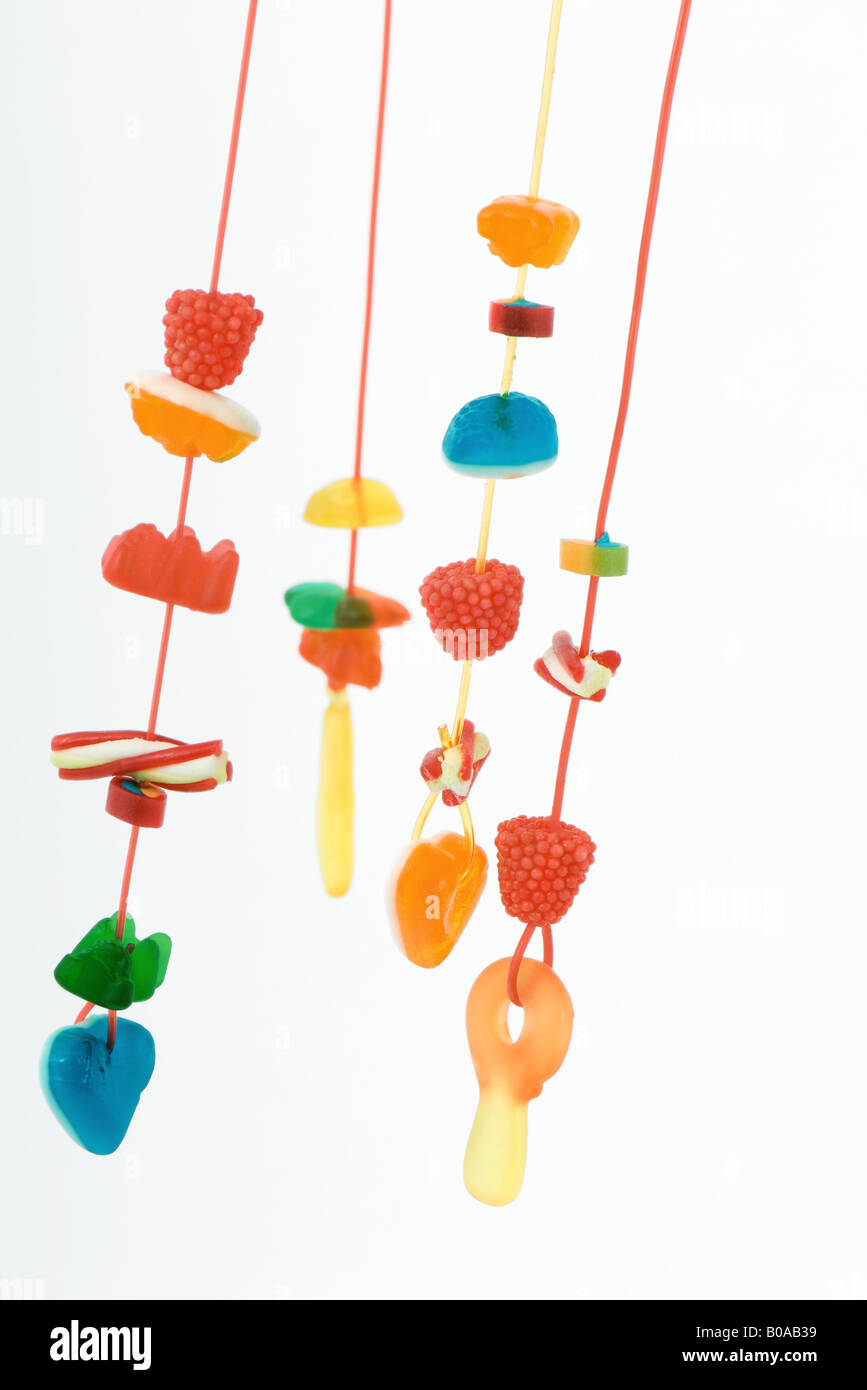 Strings of colorful candy Stock Photo Alamy