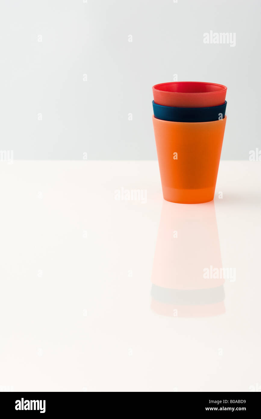Three plastic cups, stacked Stock Photo Alamy