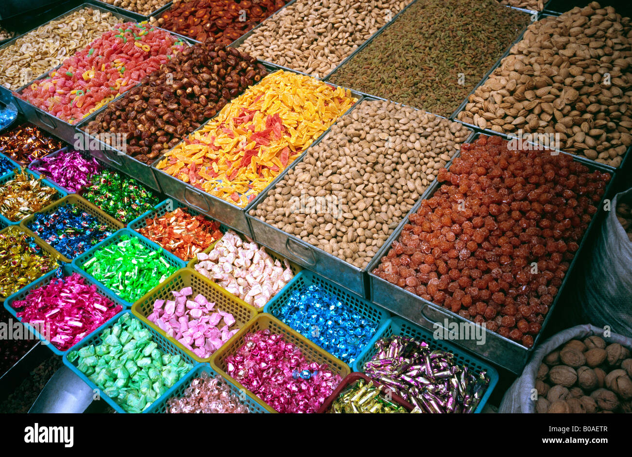 July 2, 2006 - Dried fruits and sweets for sale at Kashgar's Sunday market in the Chinese province of Xinjiang. Stock Photo