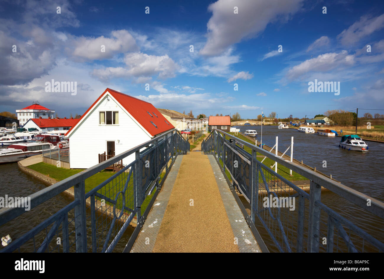 A view of Potter Heigham showing the River Thurne to the right and Herbert Woods boatyards to the left, Norfolk Broads Stock Photo