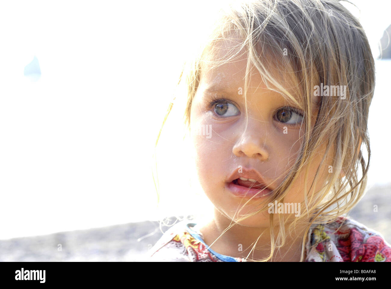 Portrait of a beautiful and tender mixed race small girl half thai Stock Photo