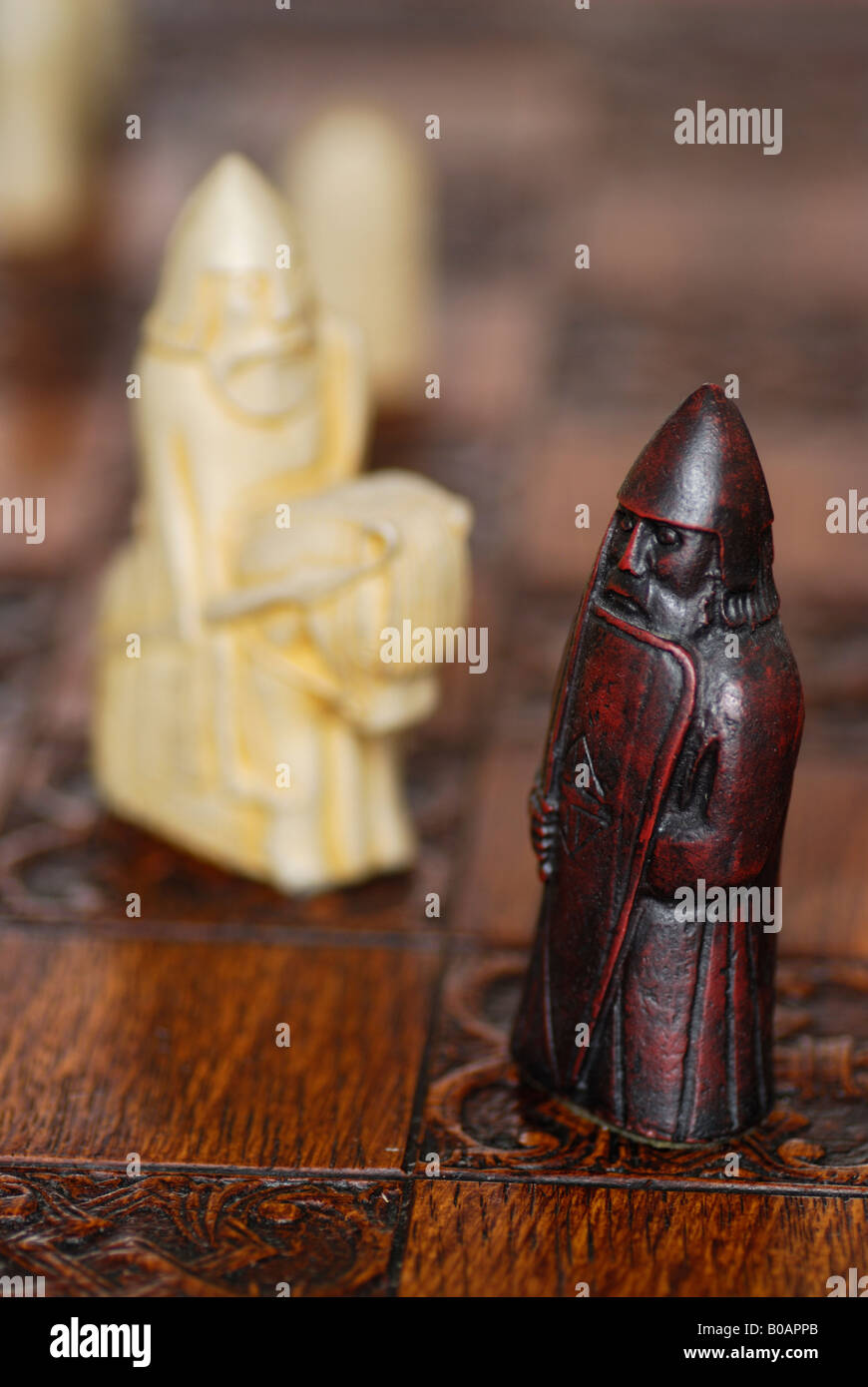 Knight and rook (berserker) from replica Lewis chess set. This is a Viking chess set discovered on the Scottish Isle of Lewis. Stock Photo