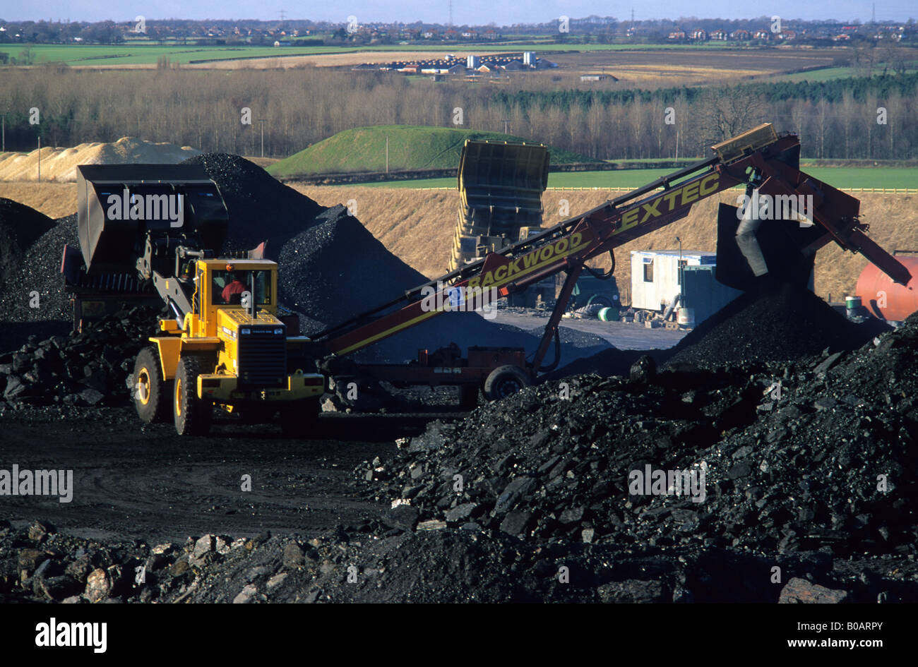 heavy machinery working at opencast coal mine Leeds Yorkshire UK Stock Photo