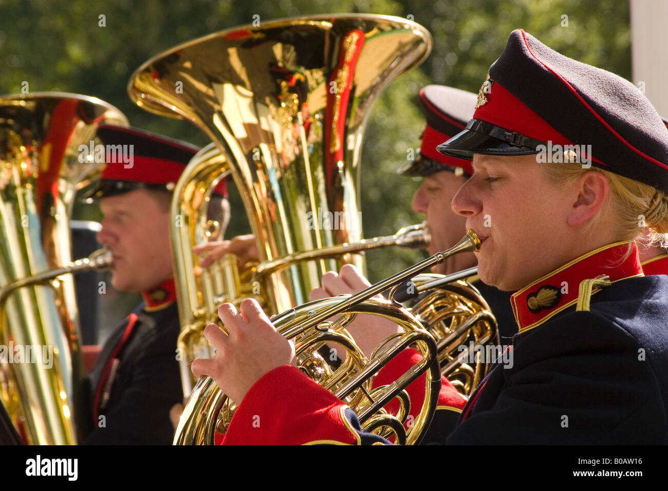 Young girl playing french horn with tubas in background Shrewsbury