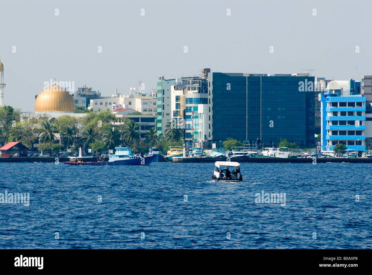View of Male the capital of the Maldives showing low lying land at threat from sea level rise Stock Photo