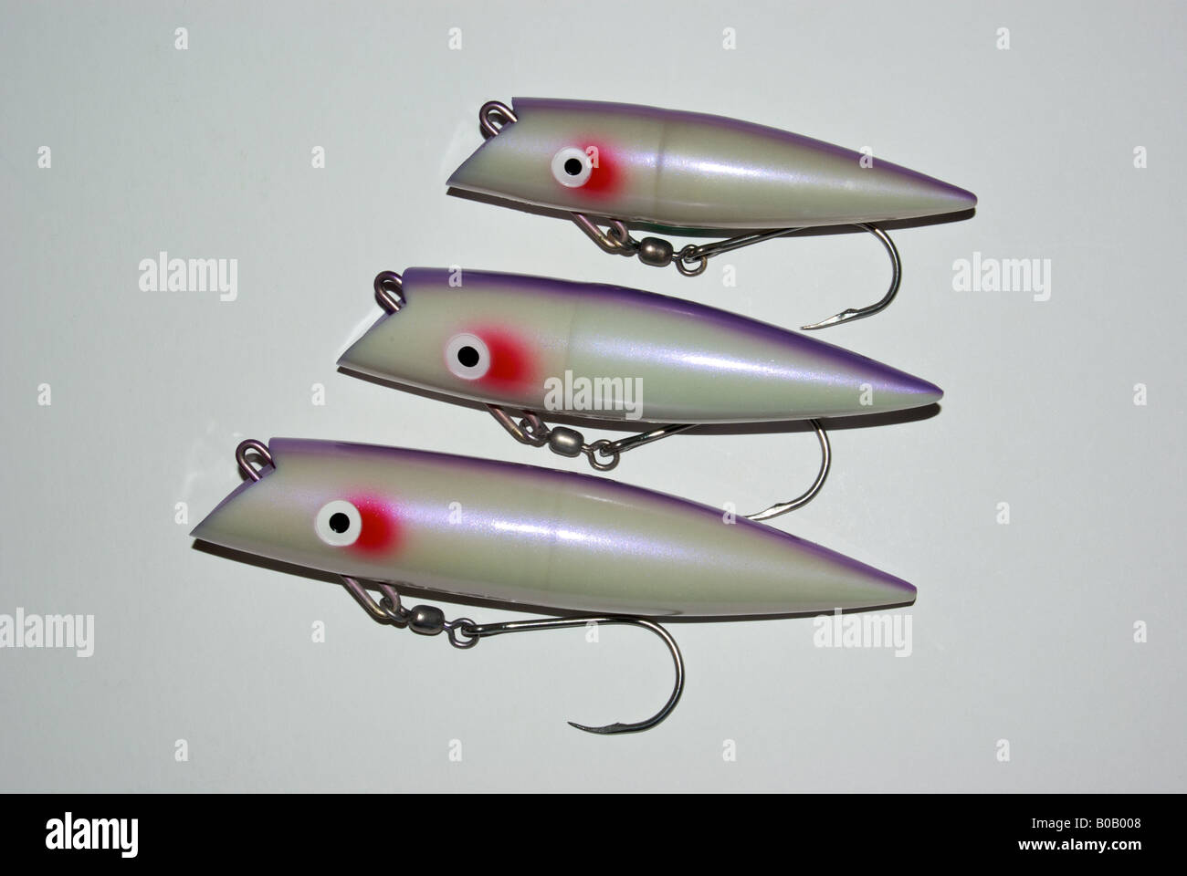 Large Tomic #530 UV Purple Glow trolling plug fishing lure will attracts  salmon and bottom fish Stock Photo - Alamy