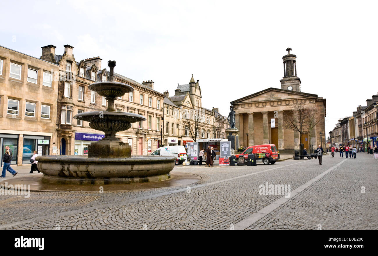 High Street Elgin Moray Scotland with fountain left and St. Giles Church right Stock Photo