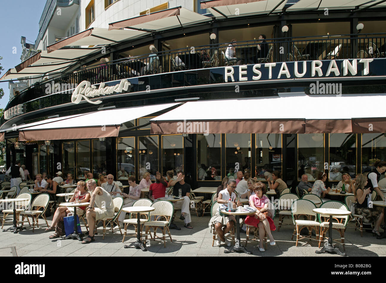 Customers at the Reinhard's Cafe at Kurfuerstendamm, Berlin, Germany