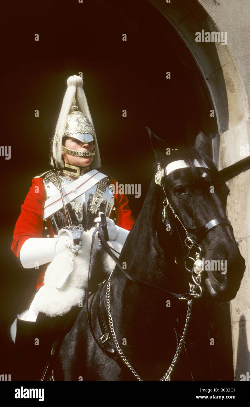 Horseguard Whitehall London cavalry soldier horse red tunic white plume plumed helmet ceremony