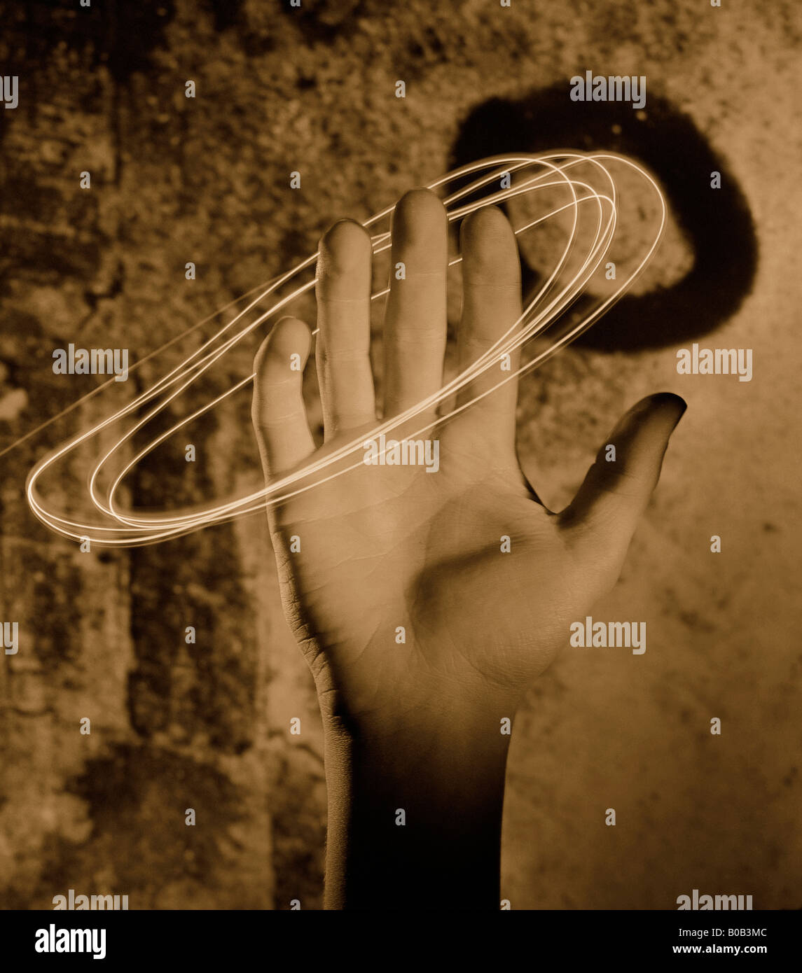 hand with light swirls Stock Photo