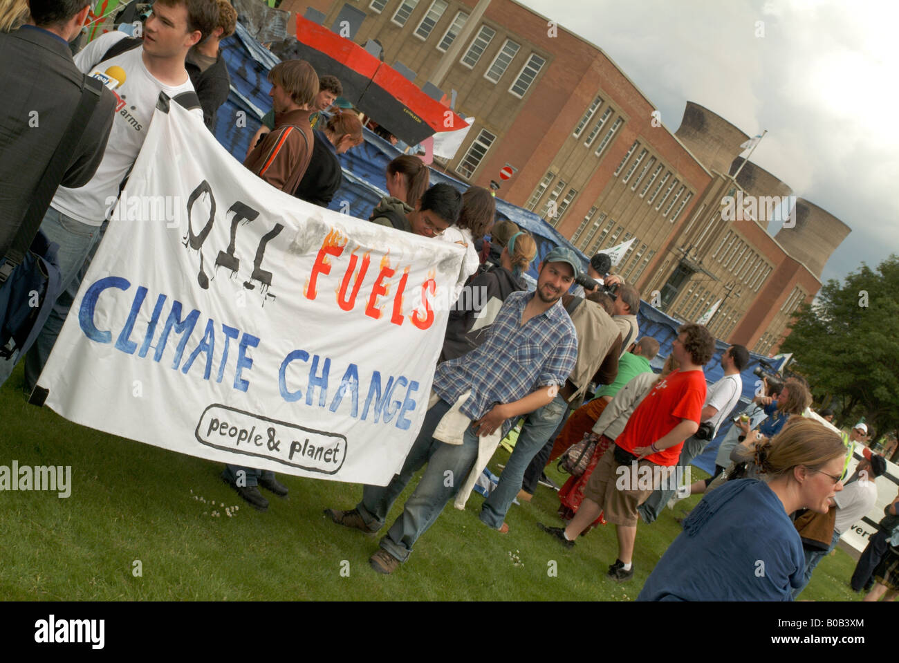 Climate change protesters holding a banner at Grangemouth Oil Refinery. Stock Photo