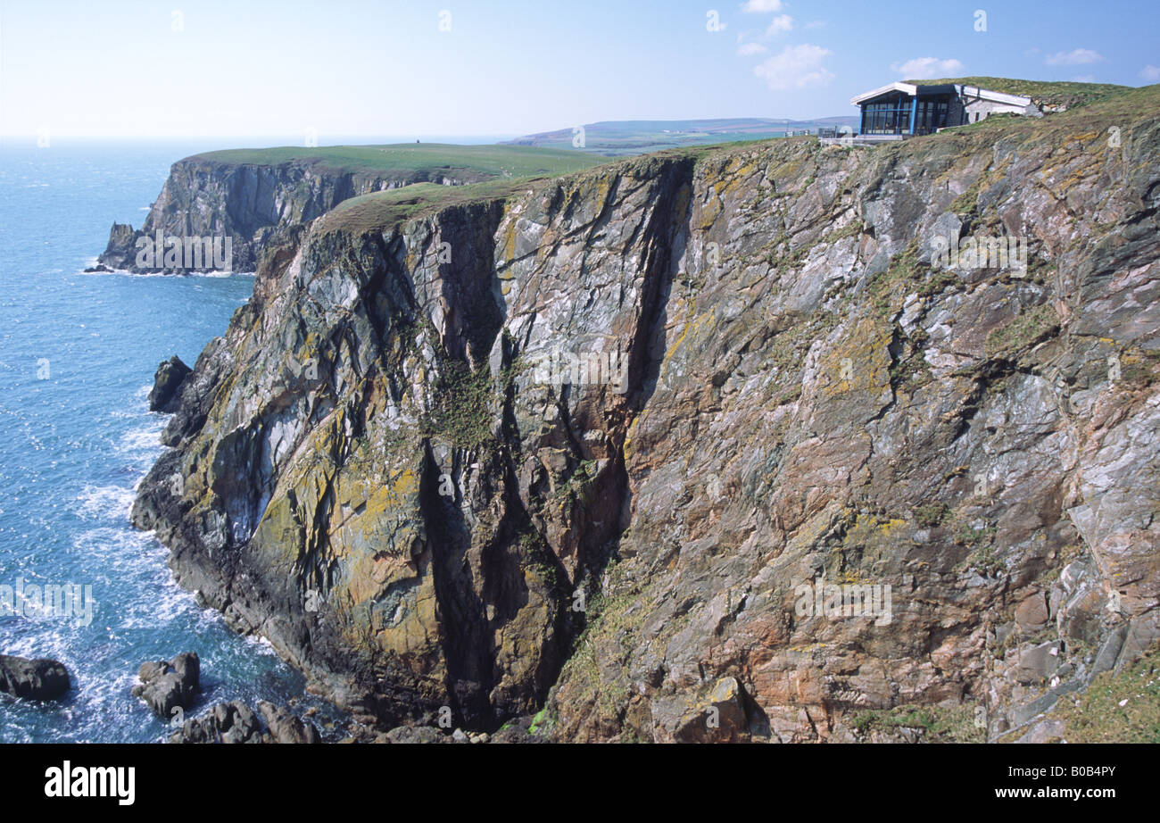 The R.S.P.B nature reserve on the Mull of Galloway looking across Gallie Craig cliff face and Gallie Craig tea room Scotland UK Stock Photo