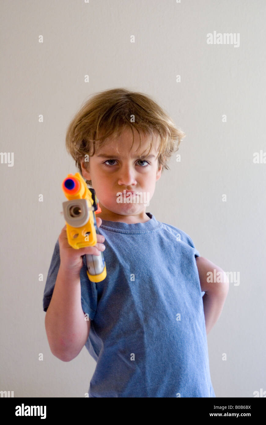 Boy with nerf gun Stock Photo