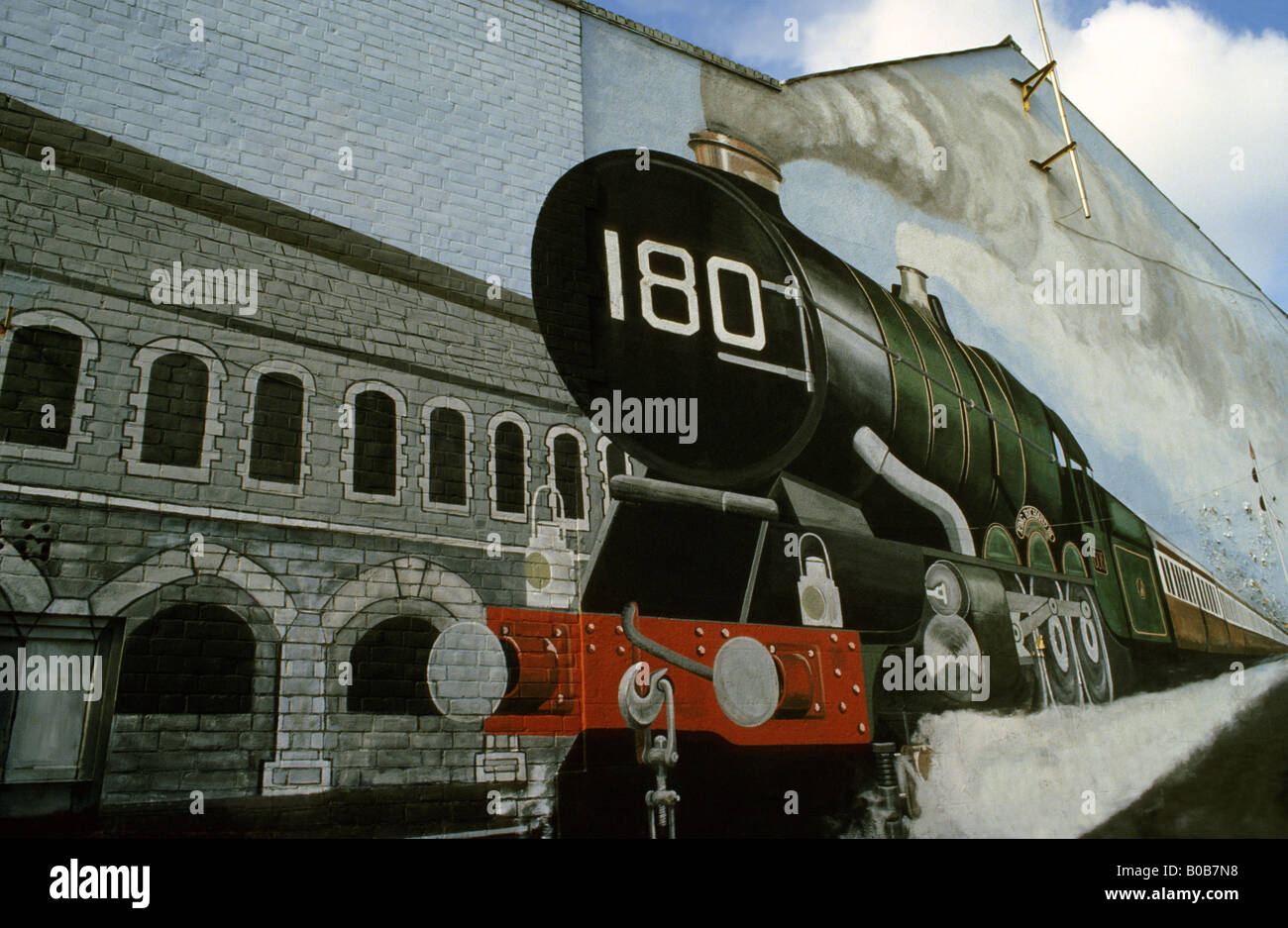 'King Class locomotive passing through Swindon Railway Works' mural (now destroyed), Swindon, Wiltshire, UK. Stock Photo