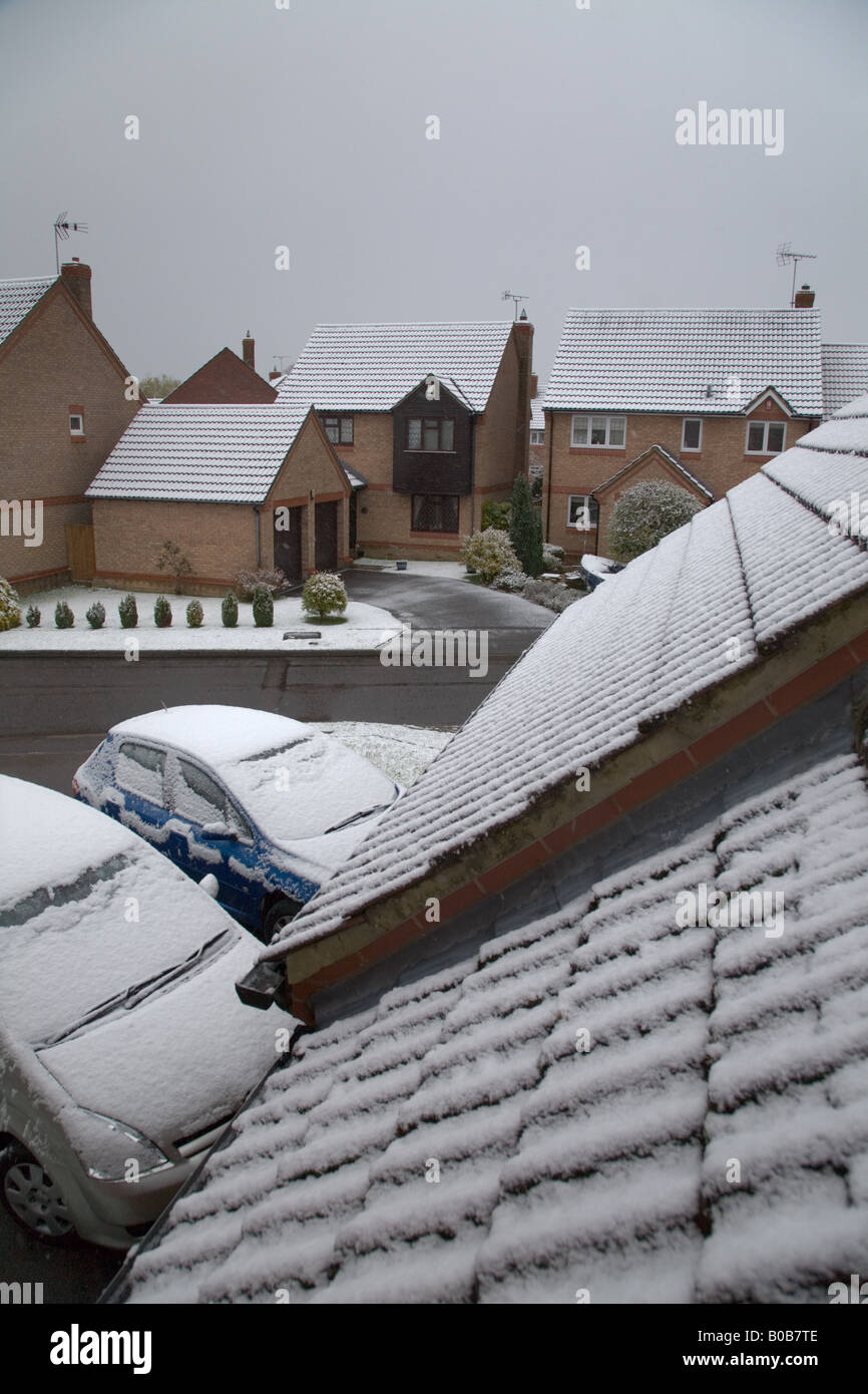Houses and cars covered in winter snow Stock Photo