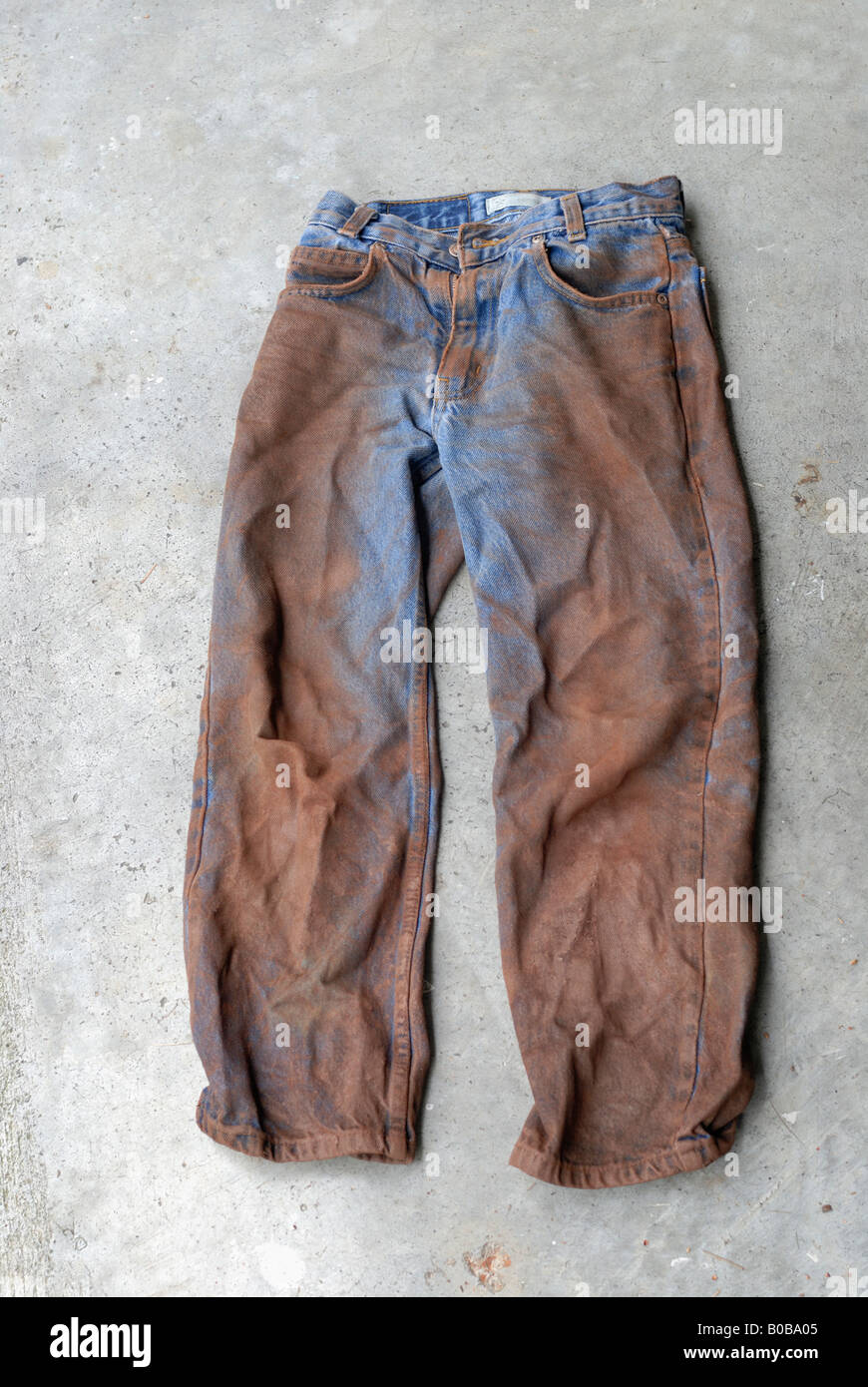 Boys dirty blue jeans Stock Photo - Alamy