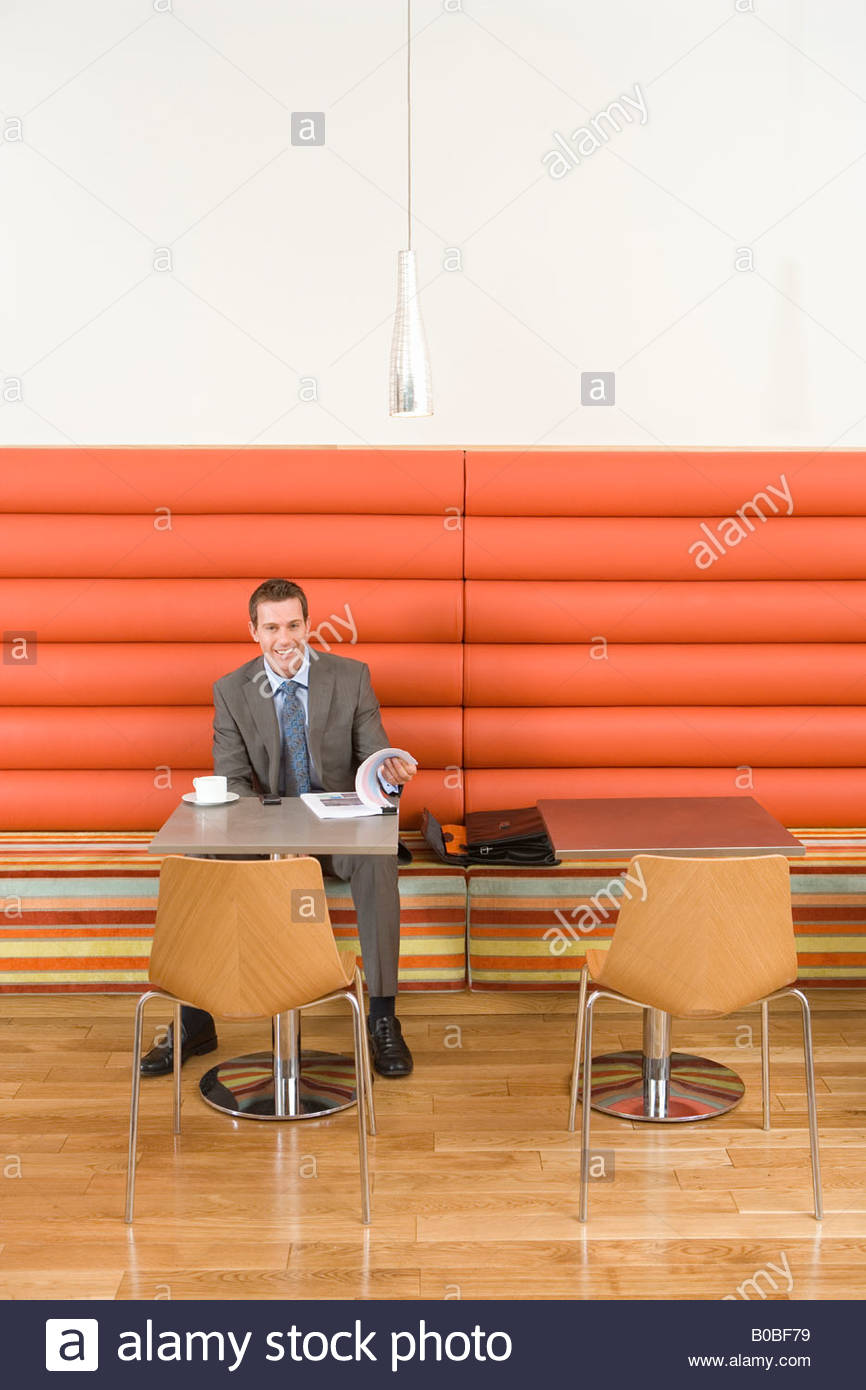 Business People Sitting In Booth Stock Photos & Business People Sitting