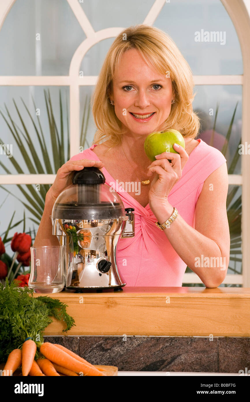 Make healthy fresh fruit drinks in a blender Stock Photo