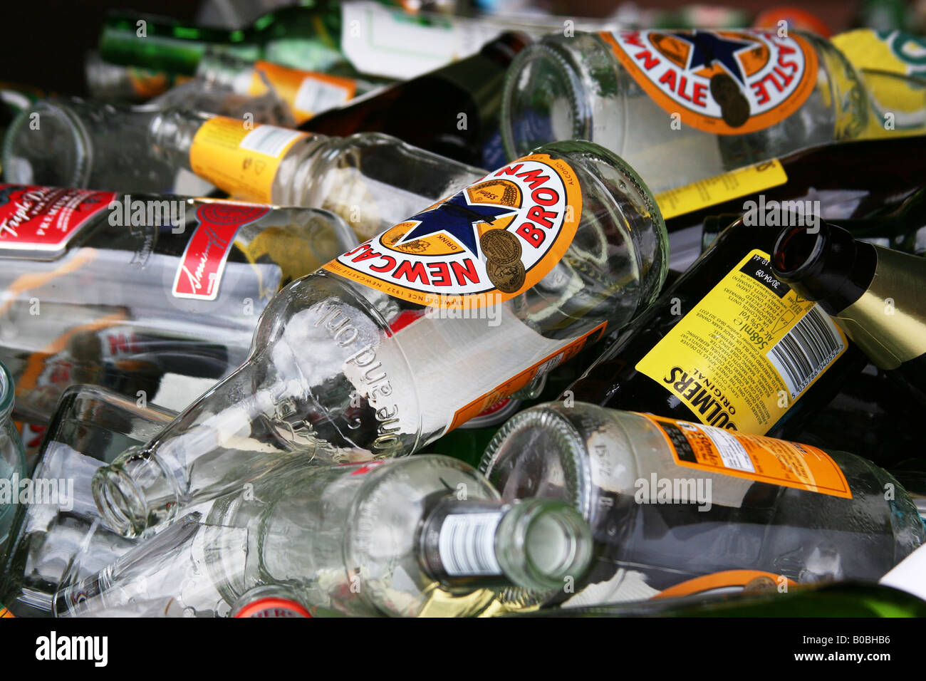 Empty glass bottles in a skip outside a public house in Yorkshire for