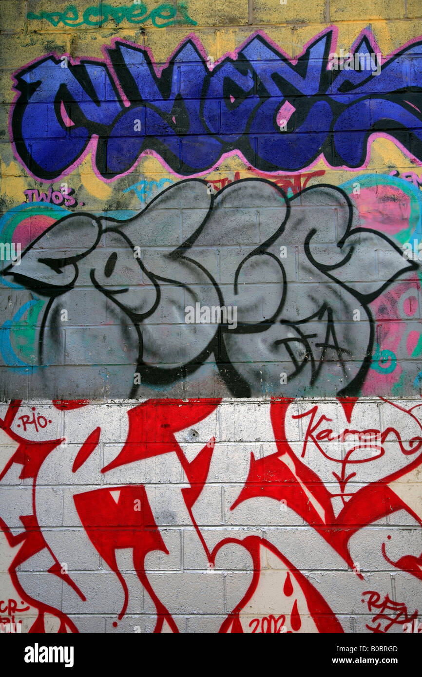 Wall covered in colourful graffiti Generic city landscape Stock Photo