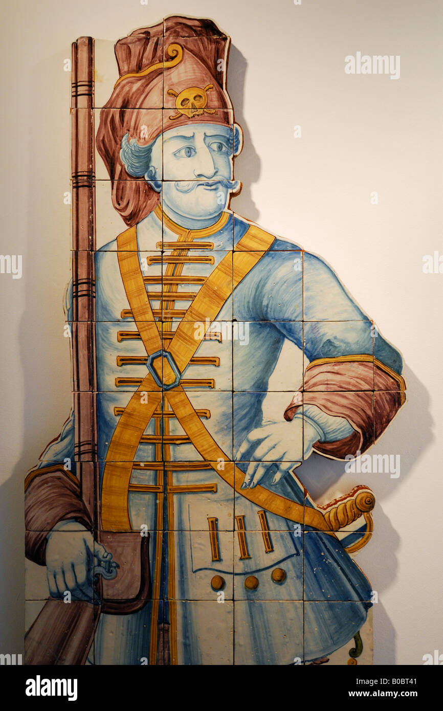 Lisbon Portugal 18th C Tile panel depicting a soldier gate keeper in the Museu Nacional do Azulejo National Museum of Tiles Stock Photo