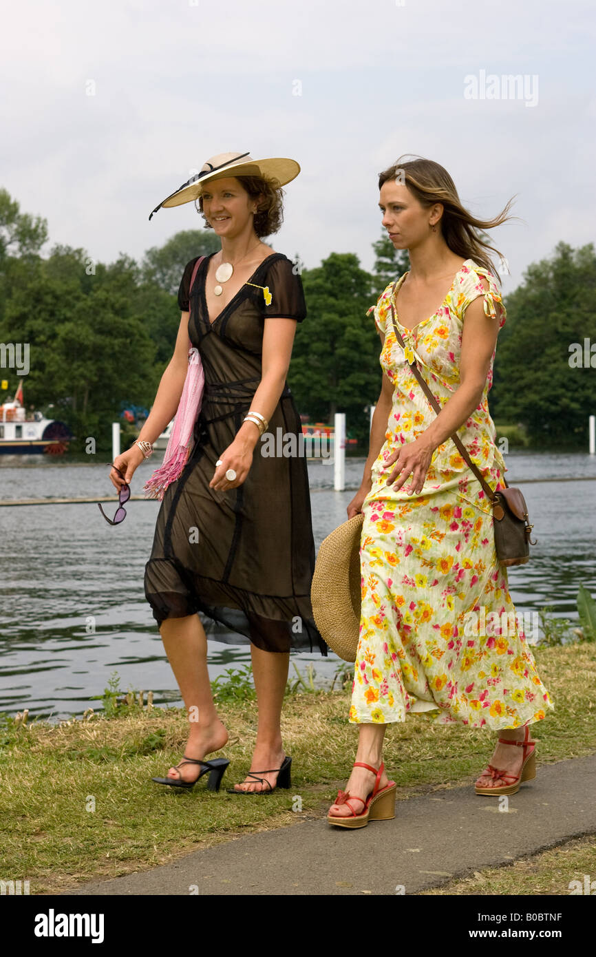 Two ladies in Summer season fashion walking along the River Thames at Stock  Photo - Alamy