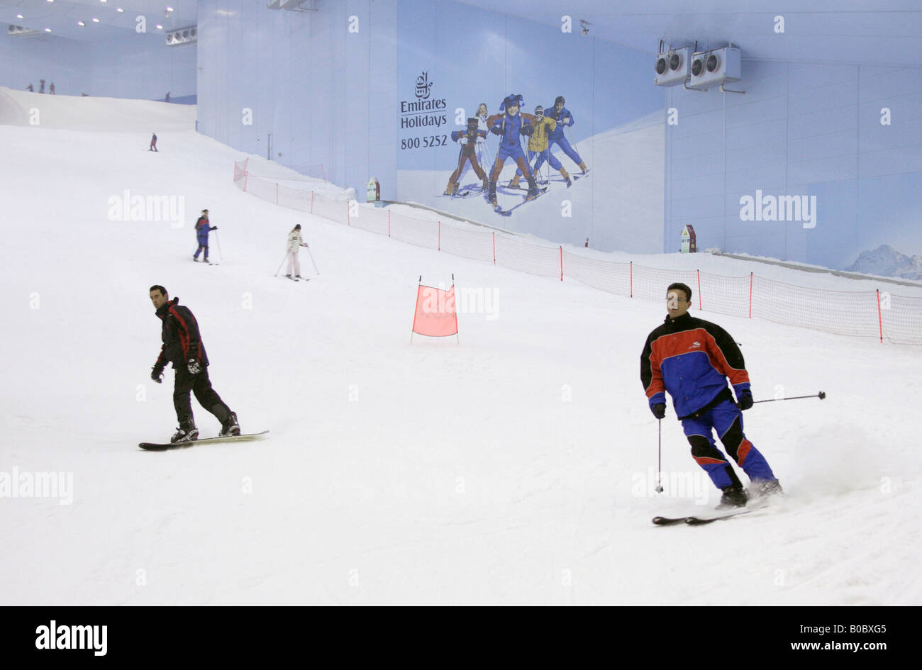 Skiers in the indoor ski centre Ski Dubai, United Arab Emirates Stock Photo