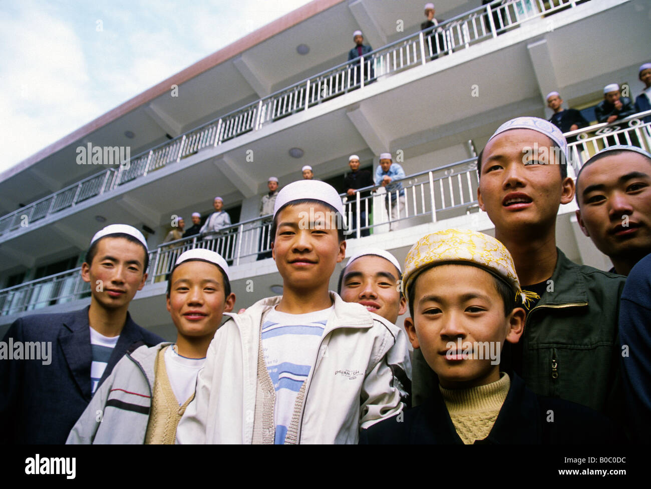 Hui Muslim students ages 14-18 in front of their dormitory at the Xi Chuan Big Mosque's Language School Stock Photo