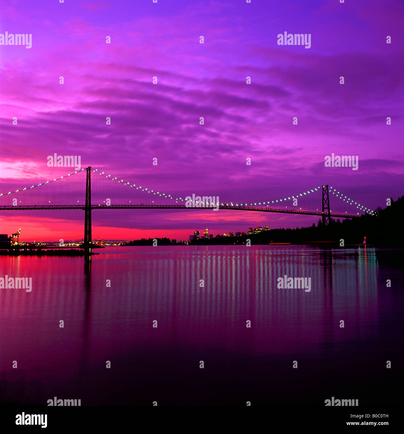 The "Lions Gate" Bridge and the Vancouver Skyline at Sunrise British