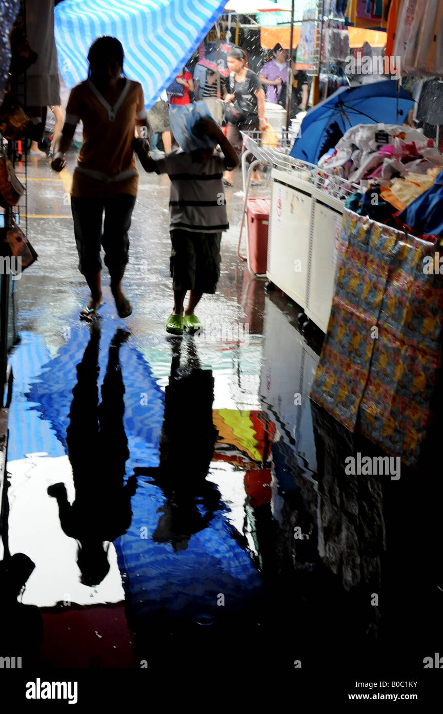 reflections, after downpour at jj market(chatuchak) Stock Photo