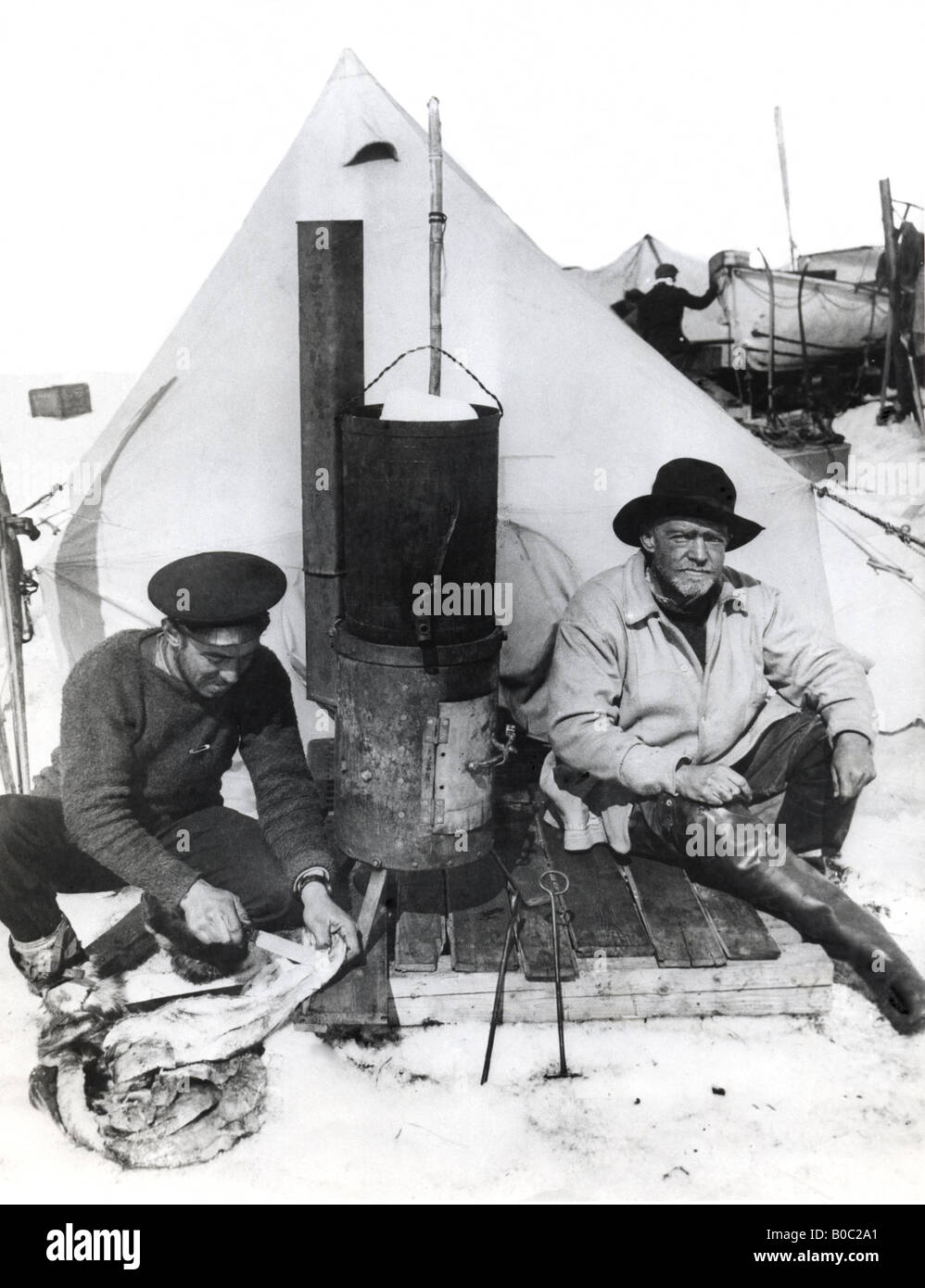 ERNEST SHACKLETON at right with Frank Hurley at Patience Camp  during their expedition to the Antarctic - see Description below Stock Photo