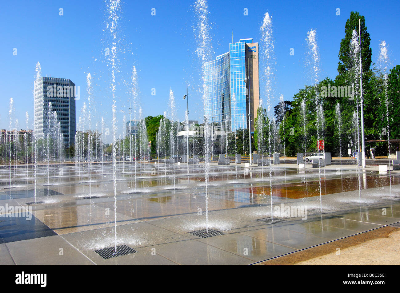 Fountains on the Place des Nations in Geneva, ITU Headquarters left, WIPO UPOV buildings on the right, Geneva Switzerland Stock Photo