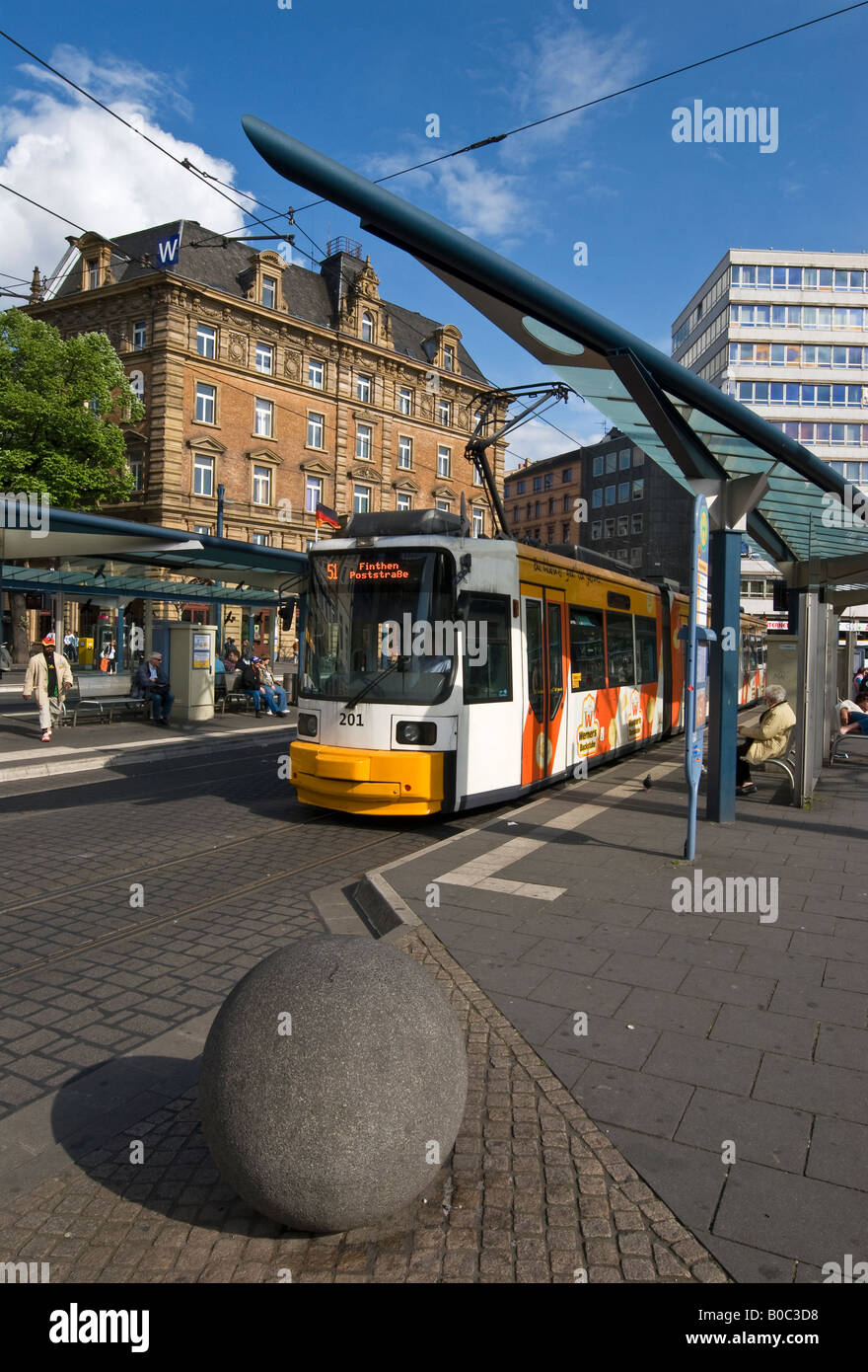 Tram waiting at the stop opposite to the main railway station in the city of Mainz in Germany Stock Photo