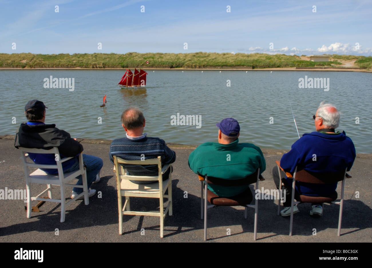 Four Gentlemen enjoying some boating at the Fleetwood Model Yacht and Powerboat Club Stock Photo