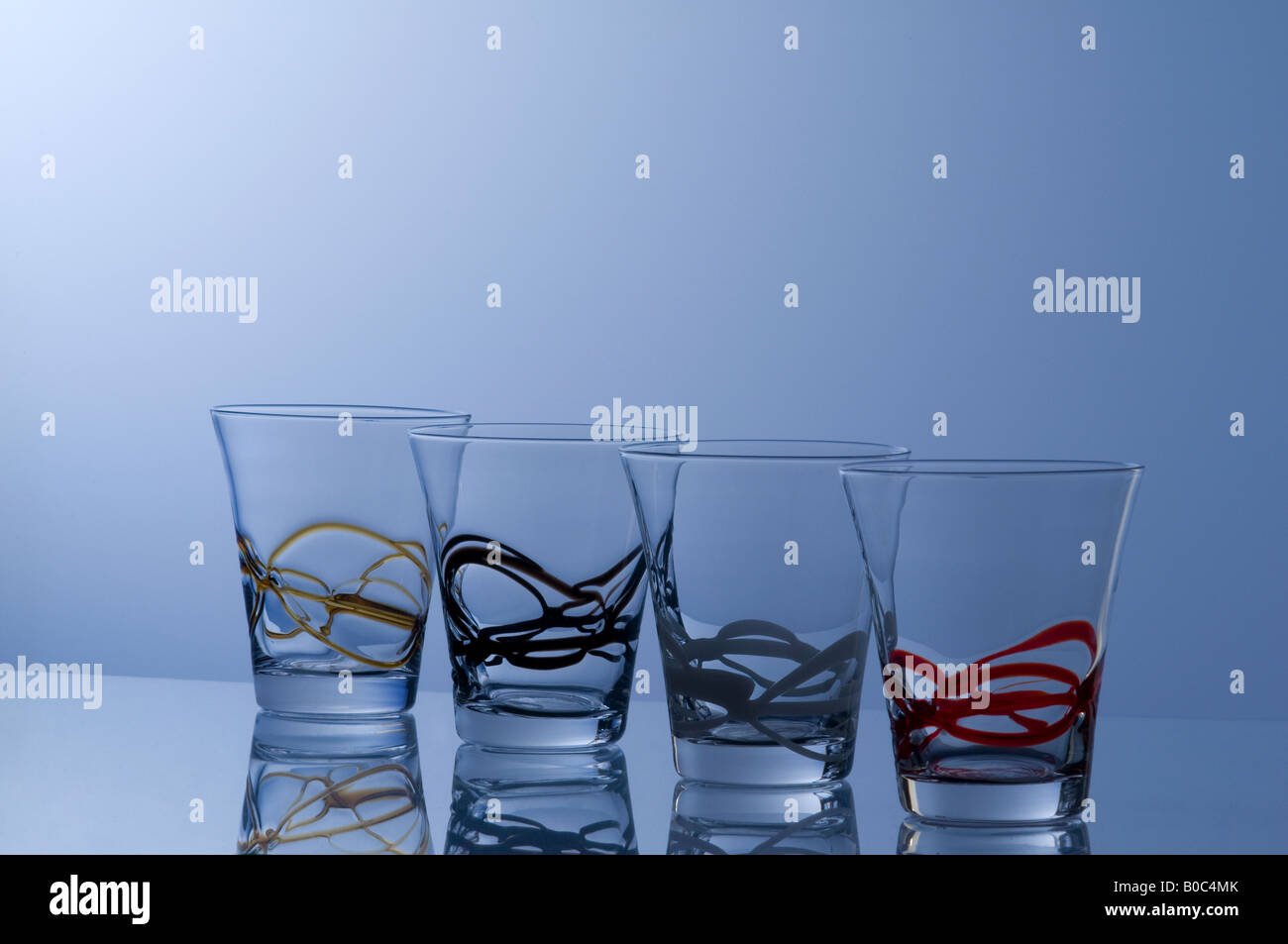 some glasses decorated on a colored surface Stock Photo