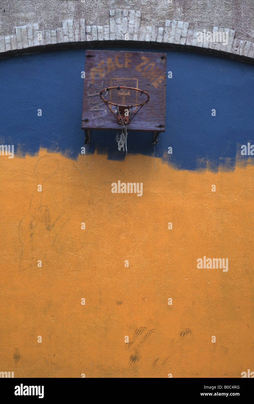 Street basketball hoop in the Crown Heights section of Brooklyn titled