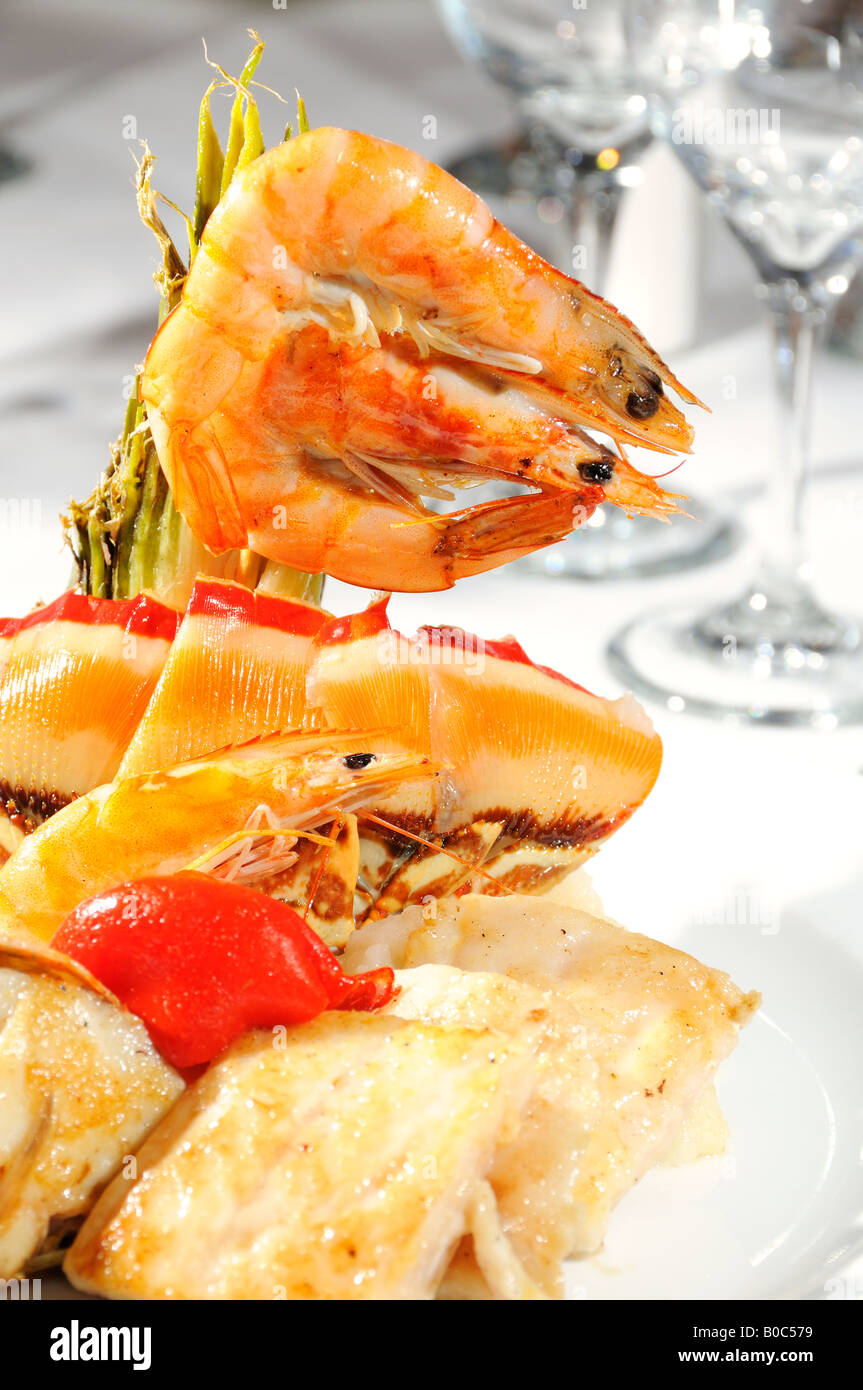Detail of gourmet seafood dish with lobster and shrimps Stock Photo