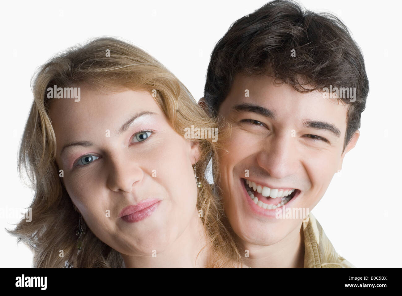 Portrait of a young couple smiling Stock Photo - Alamy