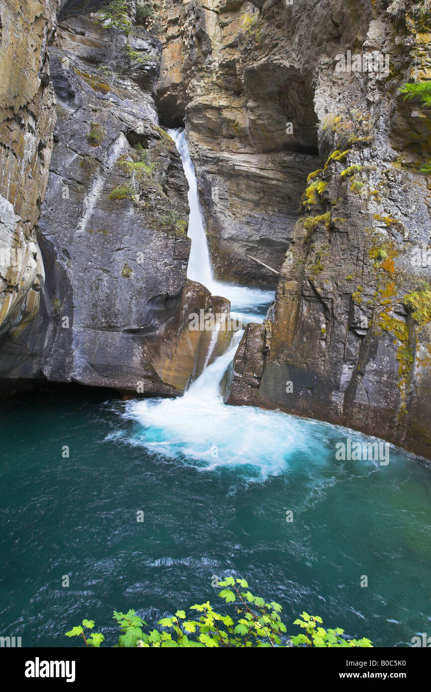 Amazingly beautiful falls with greenish water in woods of Northern Canada Stock Photo