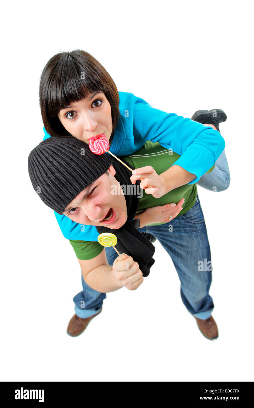 A girl and a boy with lollipops Stock Photo