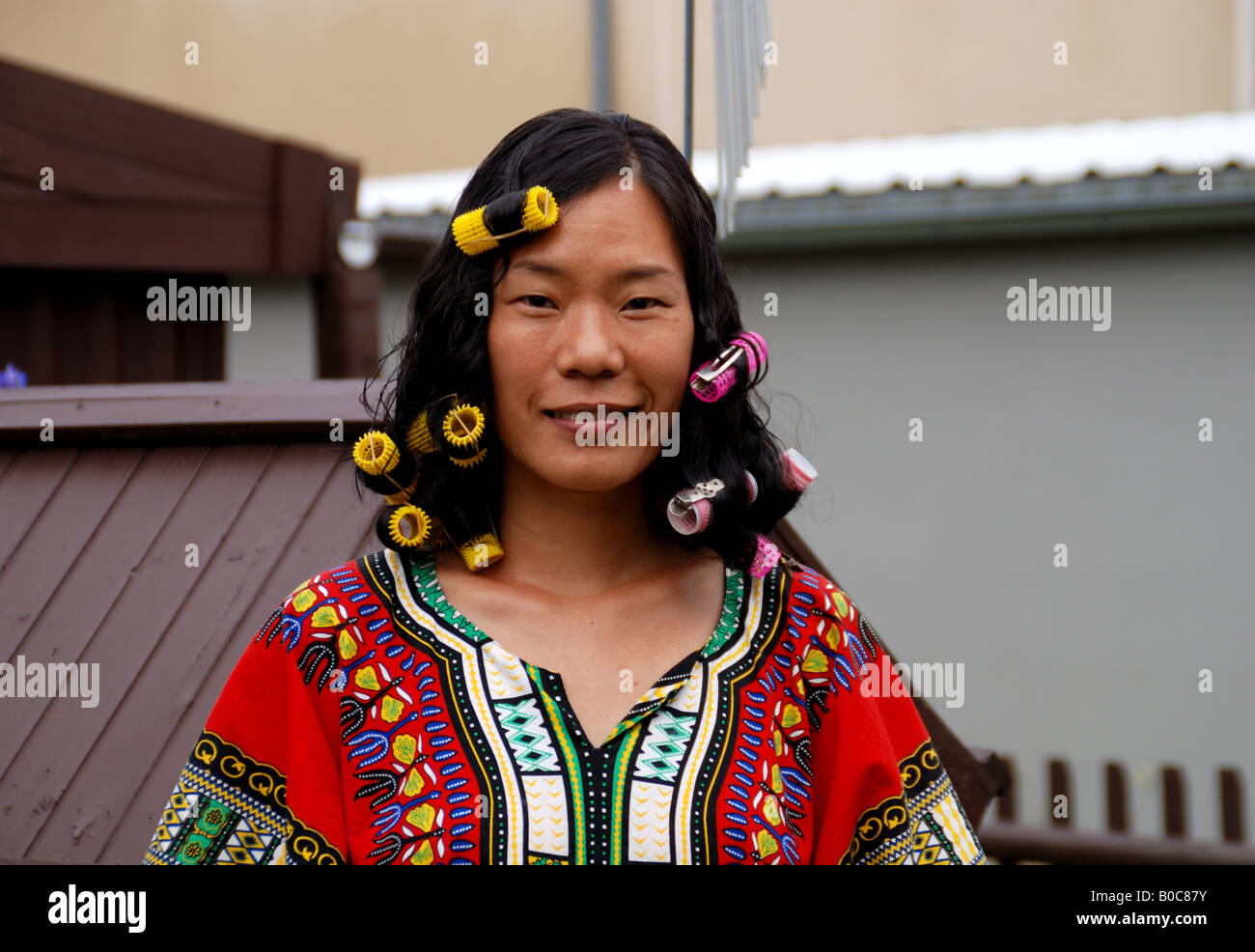a chinese moman making ringlet Stock Photo - Alamy