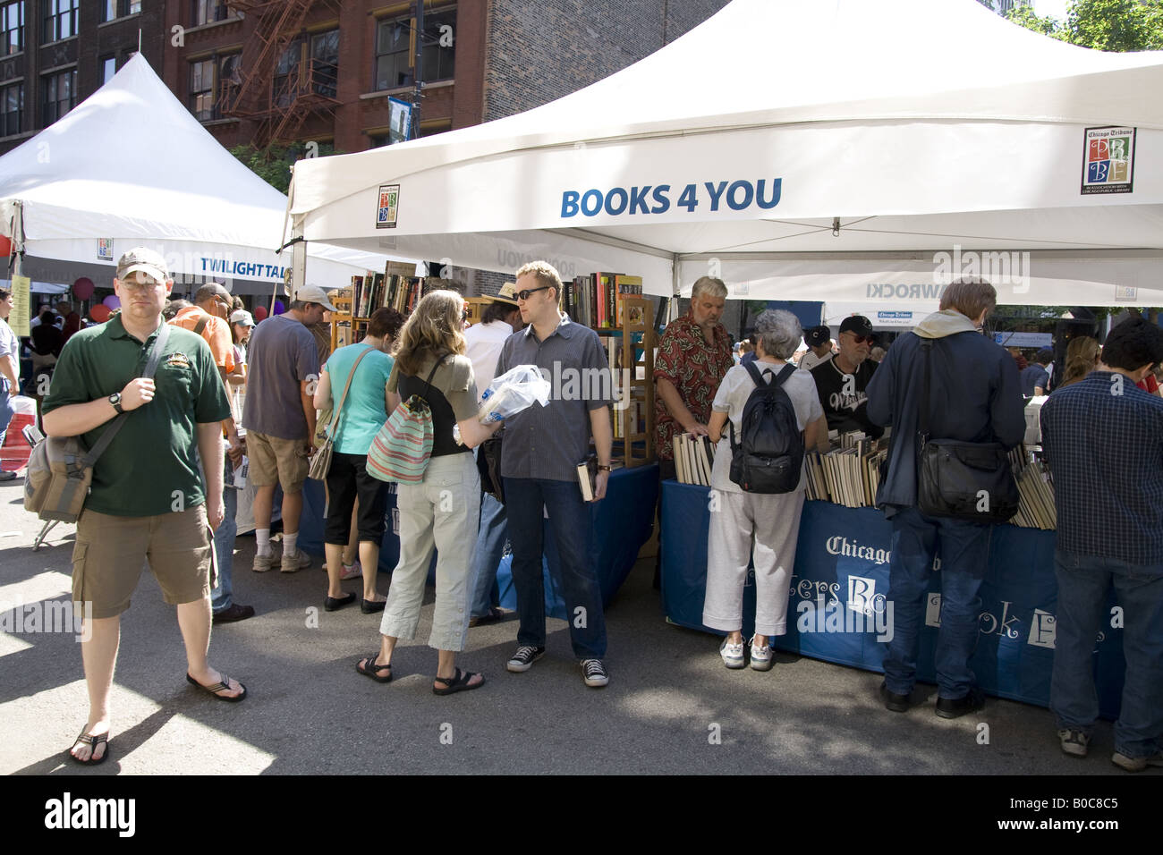 crowds walking and looking at books at the Printers Row Book Fair sale