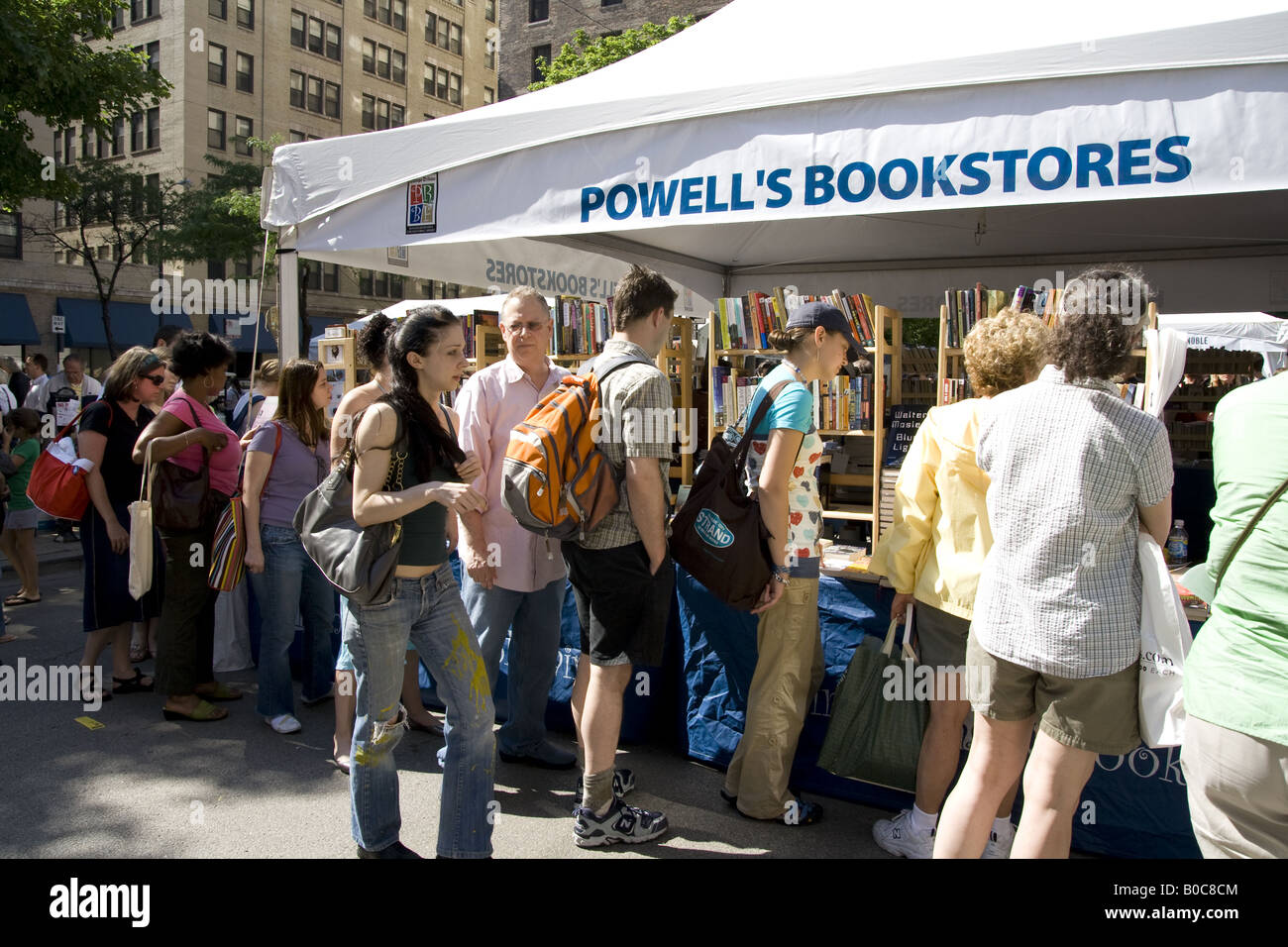 crowds walking and looking at books at the Printers Row Book Fair sale
