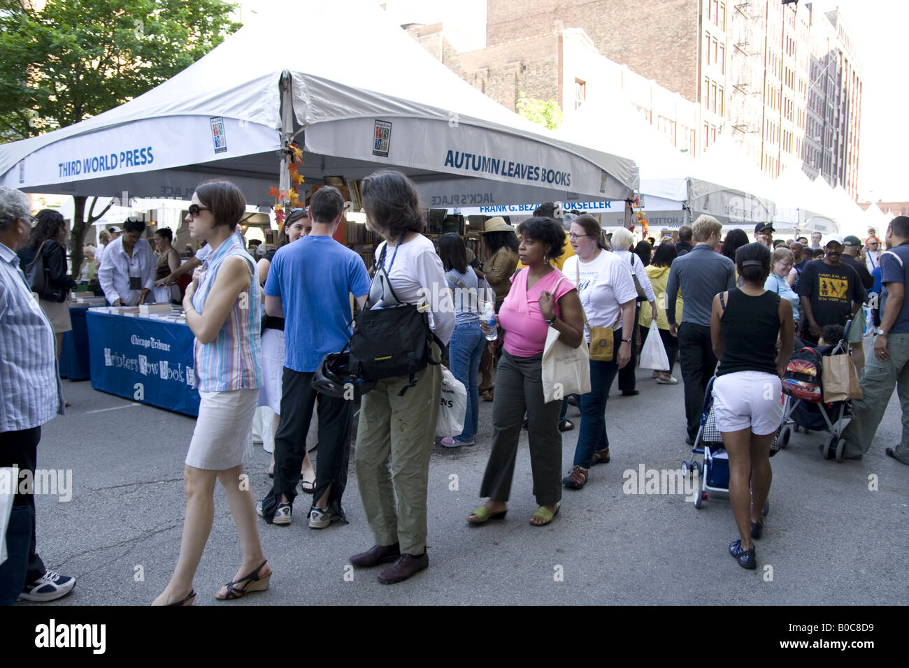 crowds walking and looking at books at the Printers Row Book Fair sale