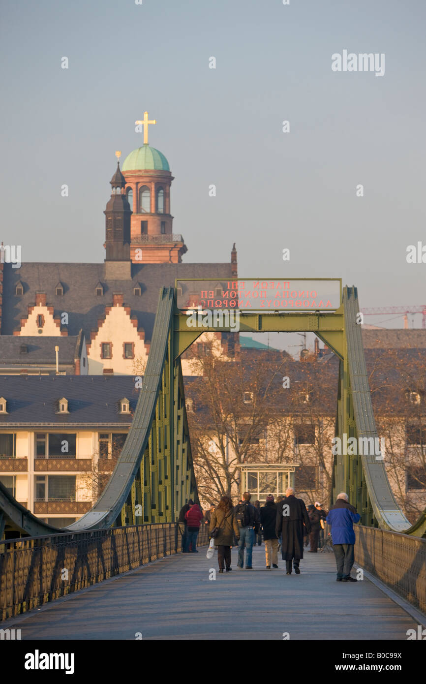 Foot traffic on the Eisemer Steg (bridge) in downtown Frankfurt, Hessen, Germany, Europe. Stock Photo